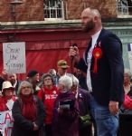 Save The Grange campaigners protest during Salford Mayor's speech on May Day
